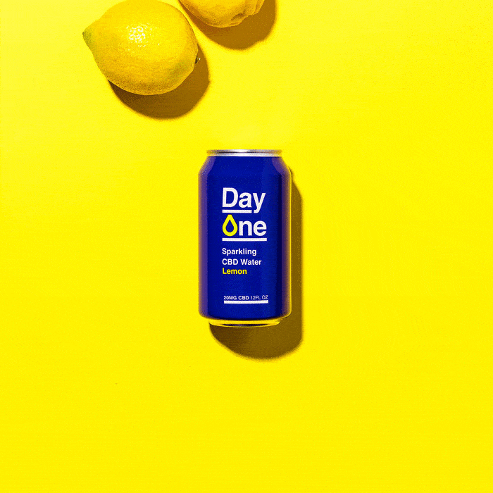 
                  
                    A Day One Lemon CBD can with Lemons scattered around
                  
                
