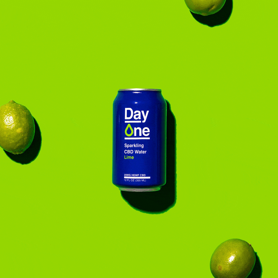 
                  
                    A Day One Lime CBD can with Limes scattered around
                  
                