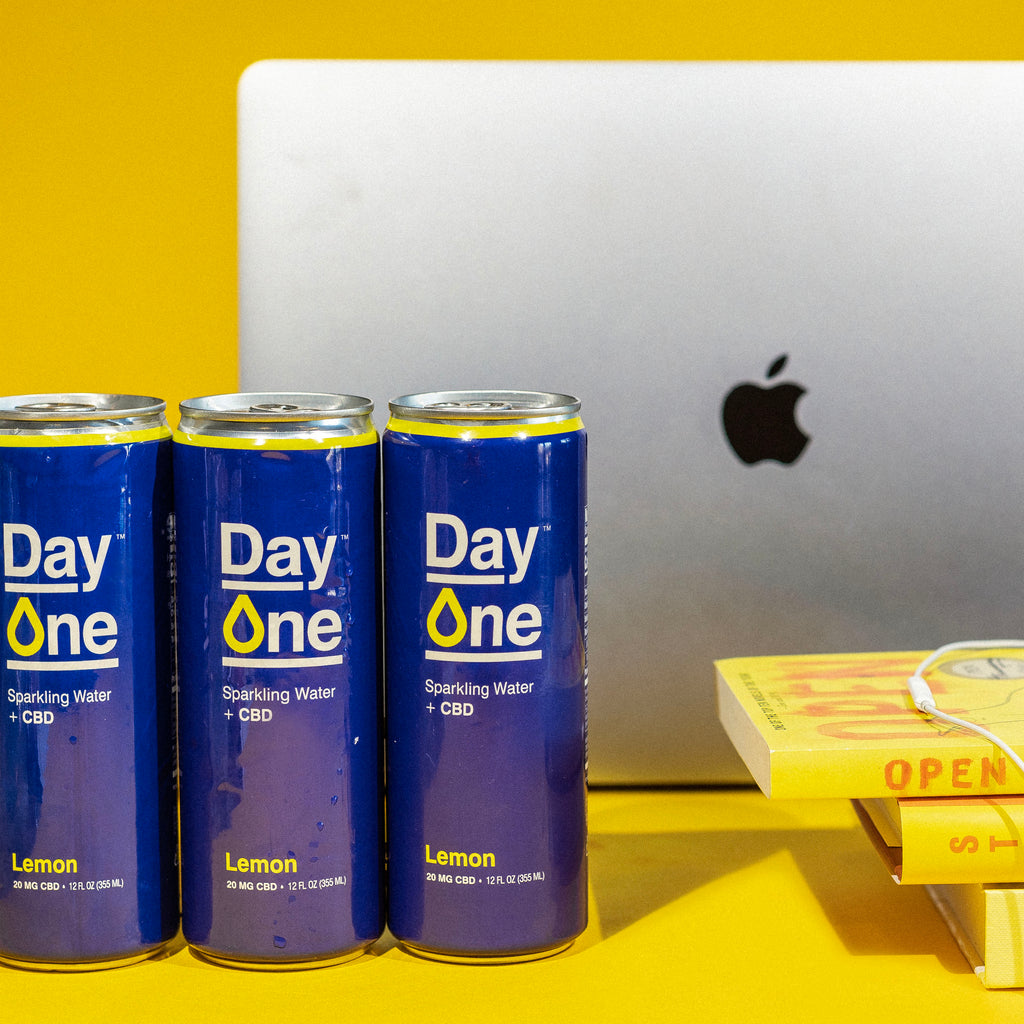 Lemon flavor day one cans on yellow background