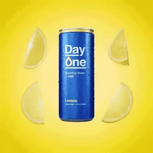 A Day One Lemon CBD can with Lemons scattered around